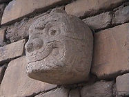 carved stone heads